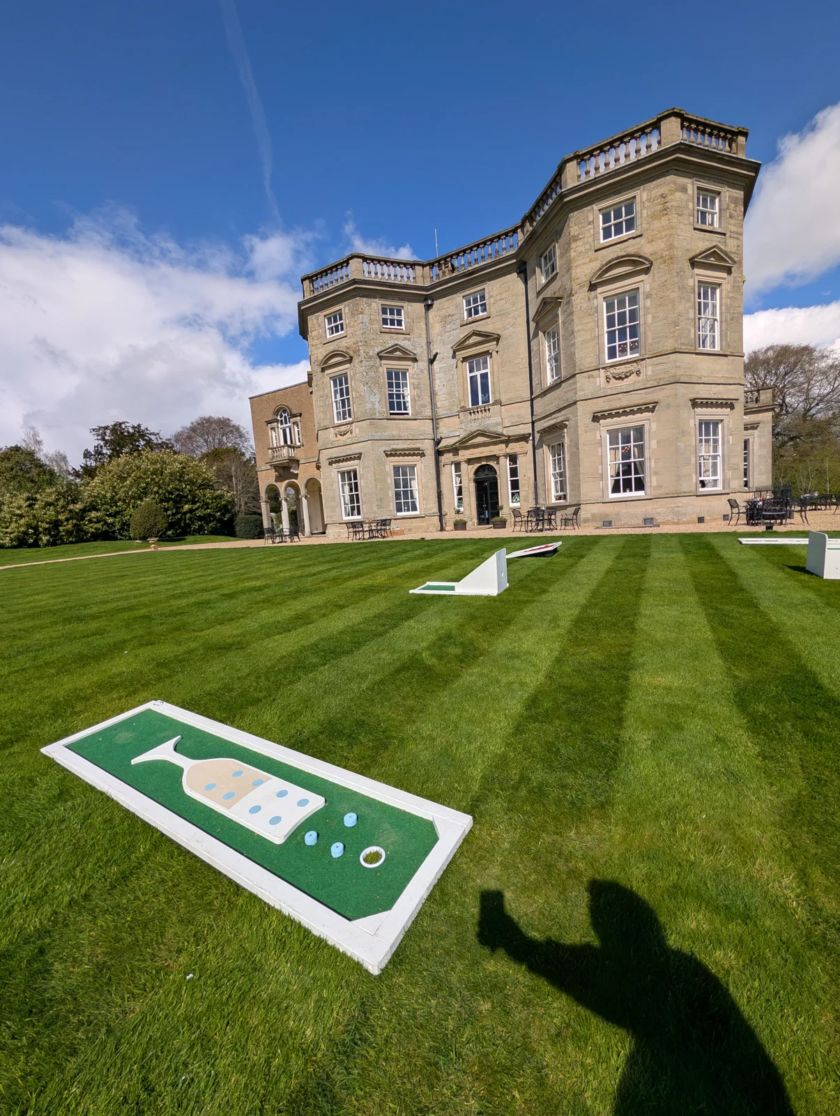Portable mini golf course arranged on a lawn