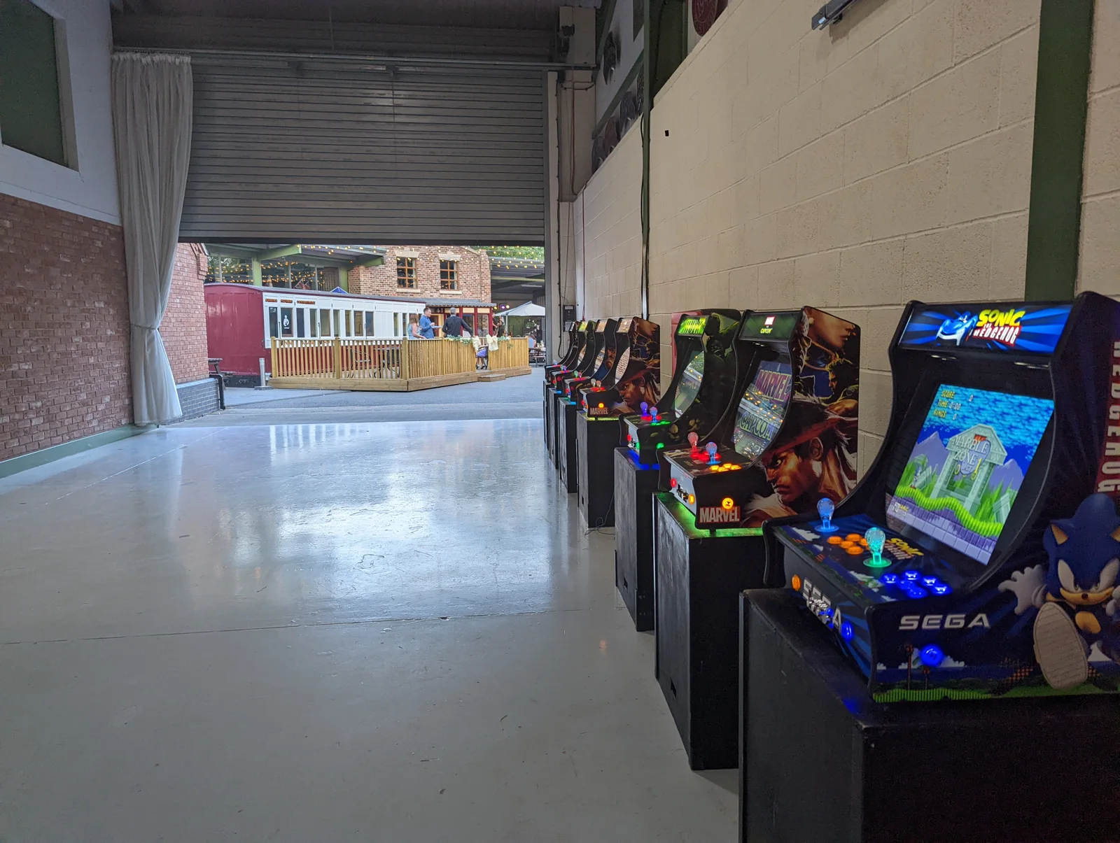 Retro arcade machines arranged in an event hall