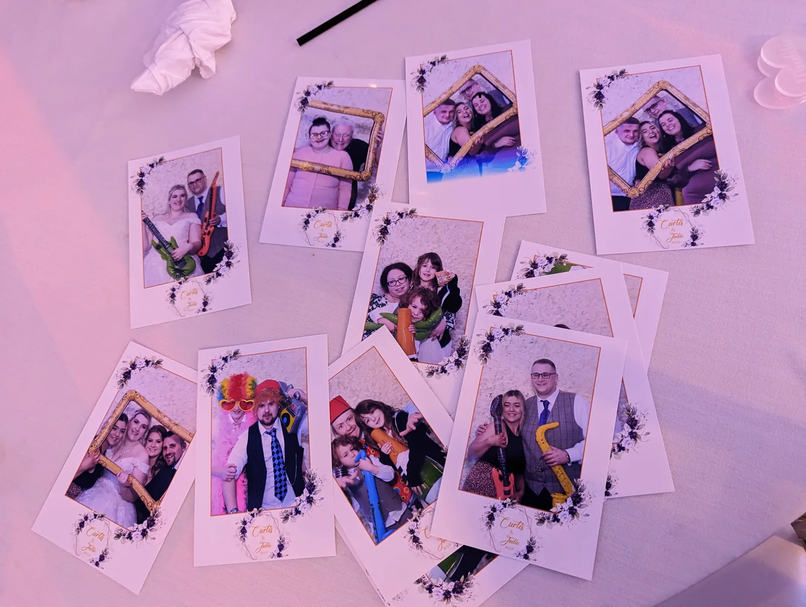 Printed wedding photobooth pictures showing guests posing together